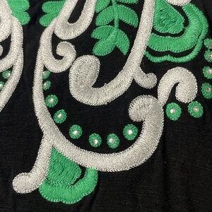 Women's embroidered tank top in white, green, and black. Size S.